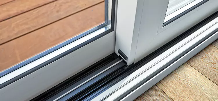 Why Your Sliding Door Keeps Getting Stuck in Dedham, MA?